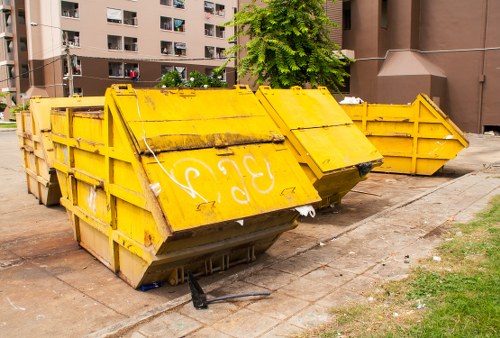 Waste collection crew preparing for collection in service area