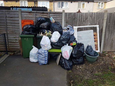 Builders clearing construction waste in Hillingdon